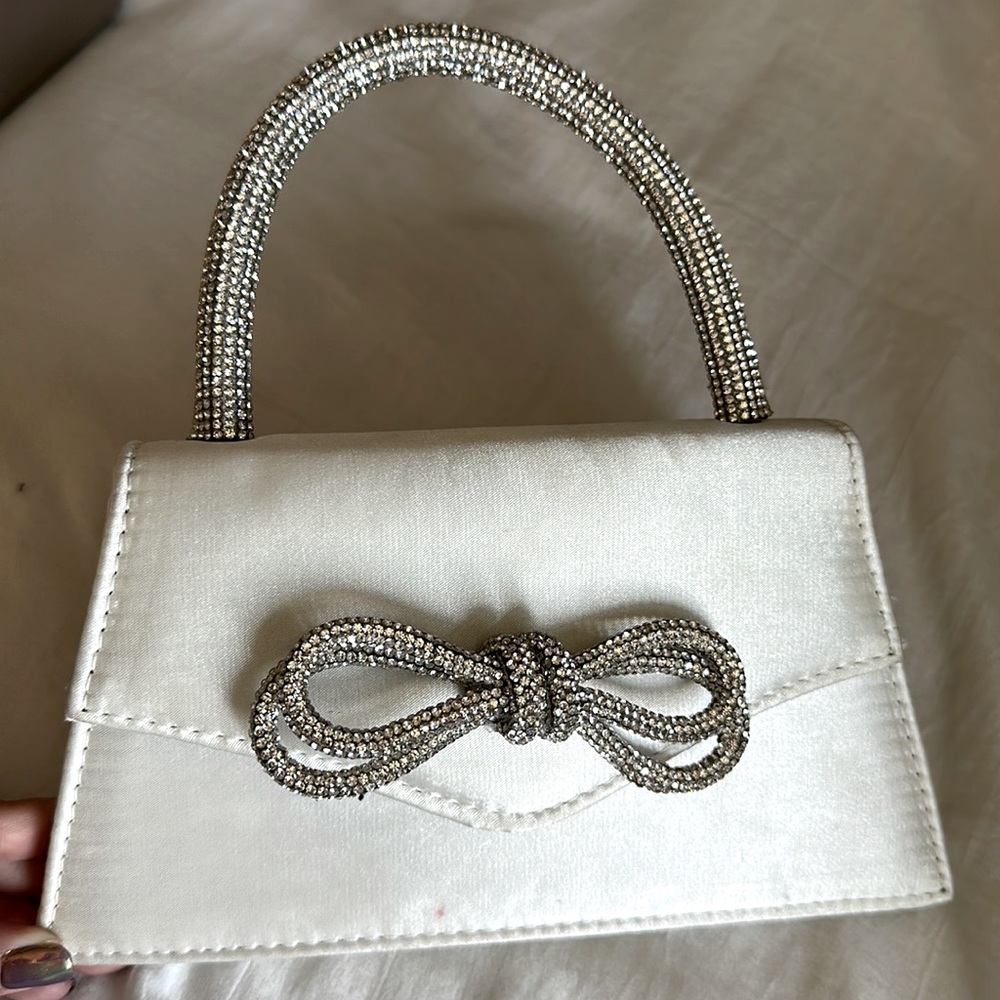 Purse with rhinestone bow